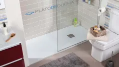 Cómo instalar un plato de ducha de resina